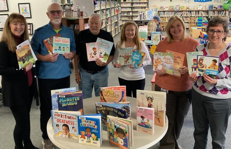 Celebrating the book donation are (l-r) Dr. Martha Sheridan, project coordinator; Allen Talbert, DDSC president; Mark Alford, DDSC vice president; Mary Ann Richmond, DDSC secretary; Lisa Petrecca, Milton library director; and Beverly Marvel, Milton library youth services coordinator. SUBMITTED PHOTO